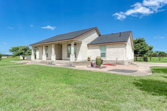 view of front of property with a front lawn and a porch