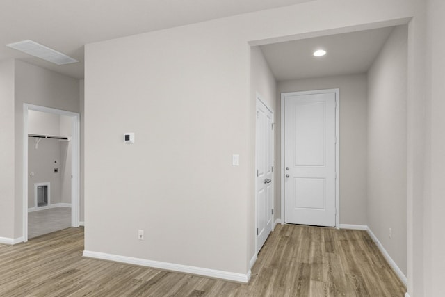 hall featuring light hardwood / wood-style flooring