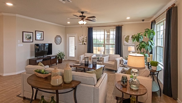 living room with crown molding, hardwood / wood-style flooring, and ceiling fan