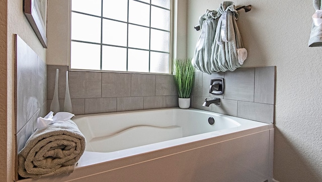 bathroom featuring a tub