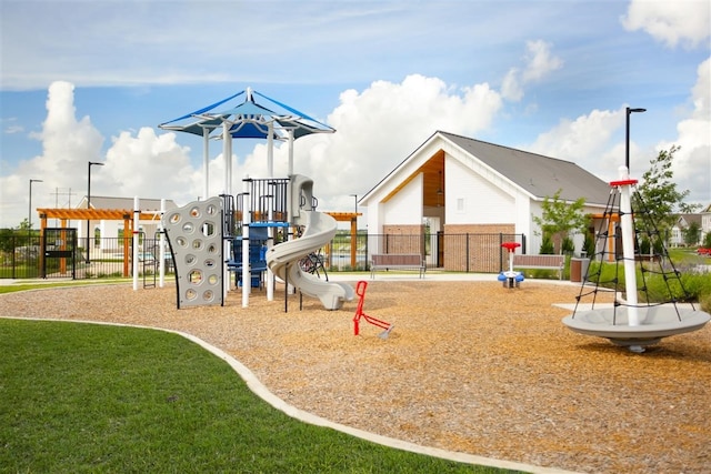 view of jungle gym with a yard