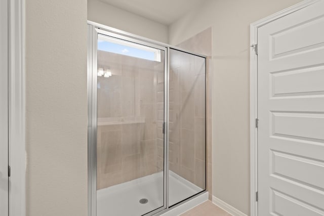 bathroom featuring walk in shower