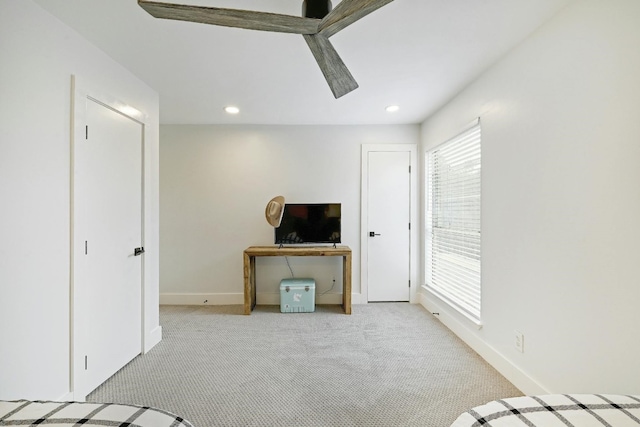 unfurnished living room featuring light colored carpet