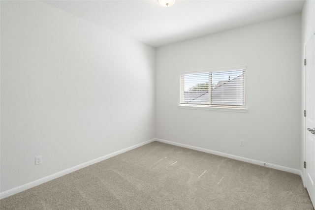 spare room with carpet flooring