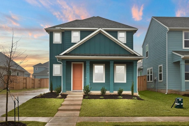 view of front of home with a lawn