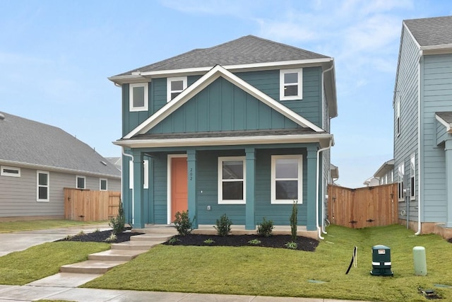 view of front of home featuring a porch and a front yard