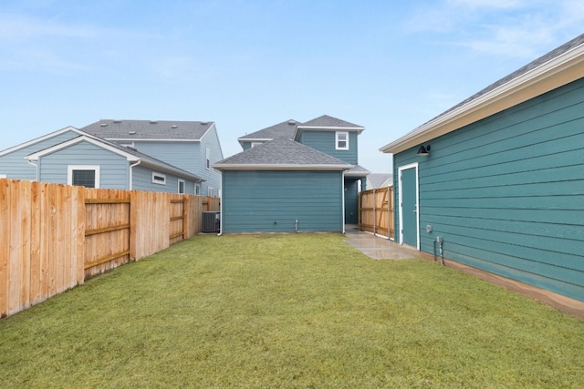 view of yard with central AC unit