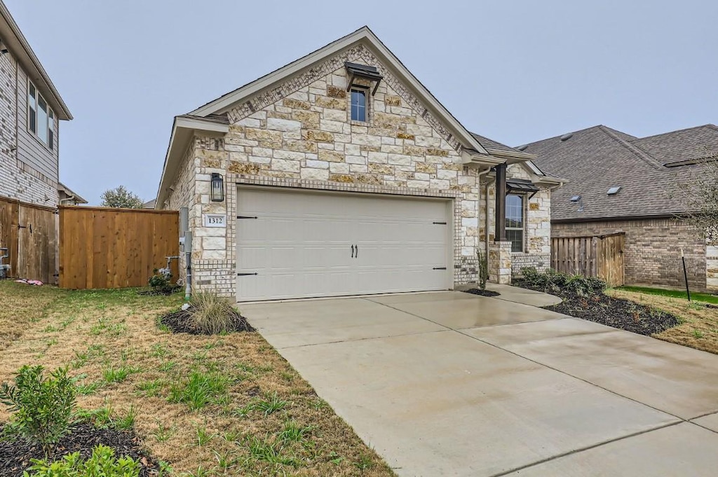 view of front of home with a garage