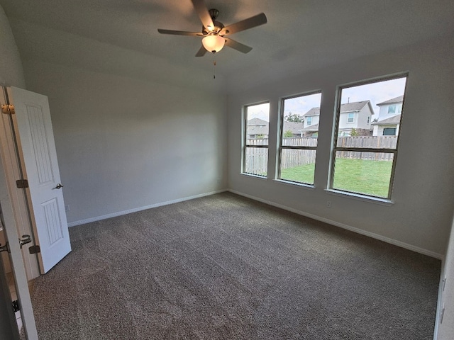 carpeted empty room with ceiling fan