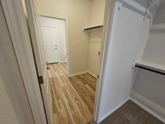 spacious closet with light wood-type flooring