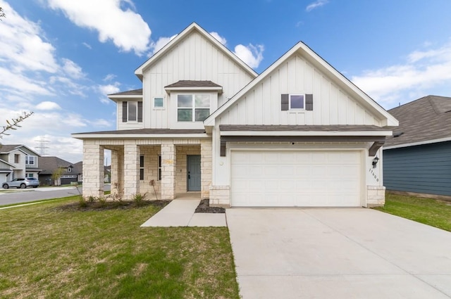 view of front of property with a porch, a garage, and a front yard