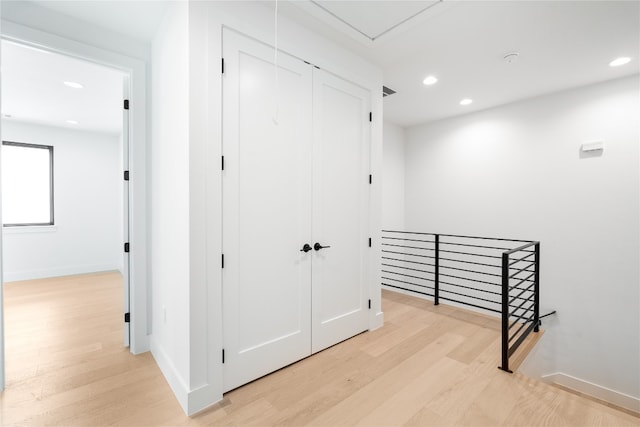 corridor featuring light wood-type flooring