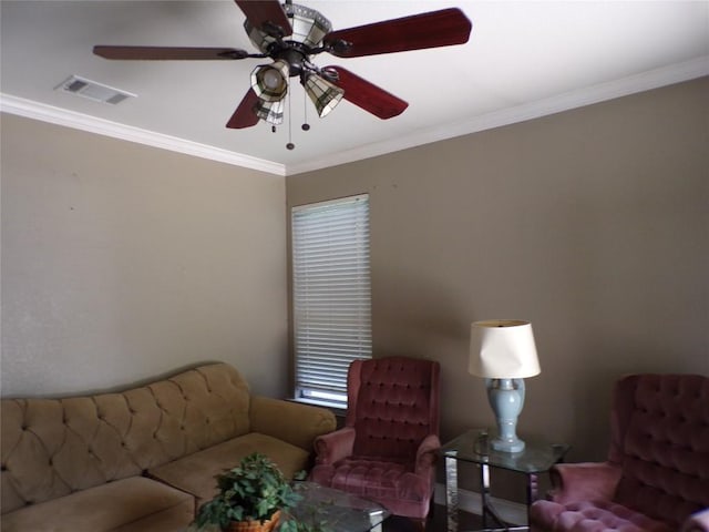 living room featuring crown molding