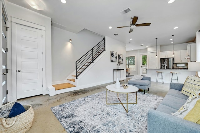 living room with ceiling fan