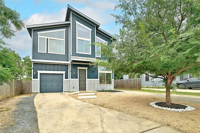 view of front of property with a garage