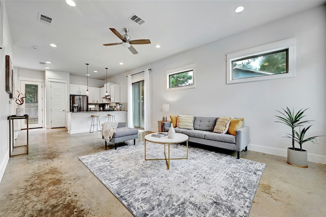 living room with ceiling fan