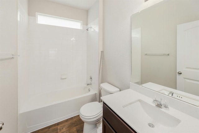 full bathroom featuring shower / bath combination, vanity, toilet, and wood-type flooring