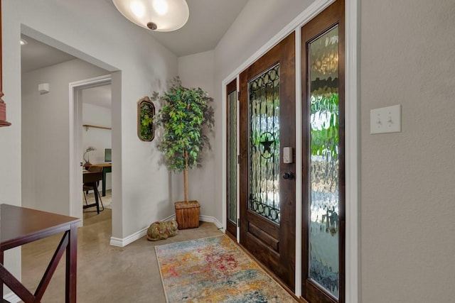 foyer entrance with baseboards