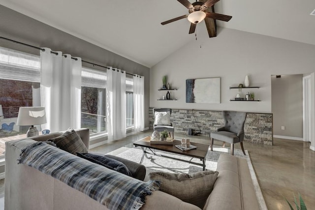 living room with baseboards, a ceiling fan, beam ceiling, finished concrete flooring, and high vaulted ceiling