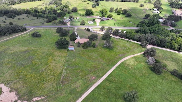 birds eye view of property featuring a rural view