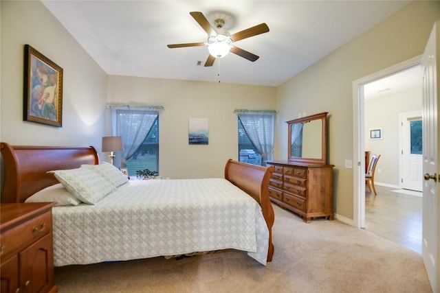 1502 Hi Cir S, Horseshoe Bay, TX 78657 - bedroom with light carpet and ceiling fan