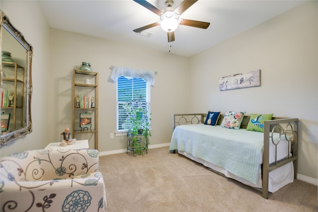 bedroom featuring ceiling fan and carpet flooring