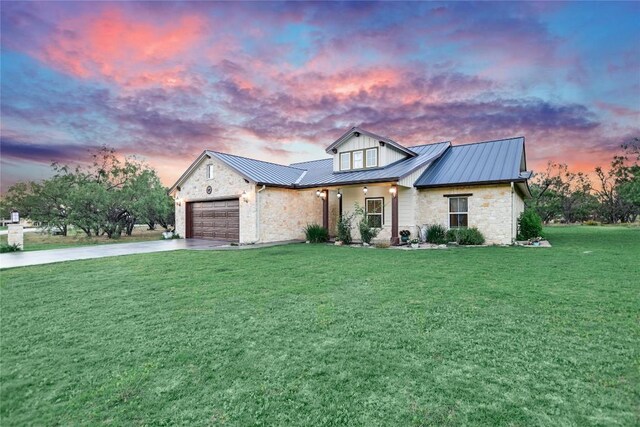 1502 Hi Cir S, Horseshoe Bay, TX 78657 - modern inspired farmhouse with stone siding, concrete driveway, an attached garage, a lawn, and a standing seam roof