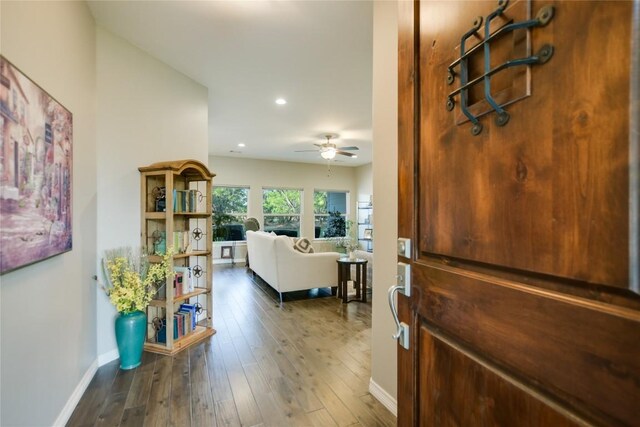 entryway with ceiling fan and hardwood / wood-style floors