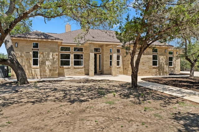 back of property featuring a patio