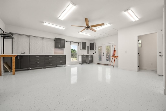 garage with a ceiling fan