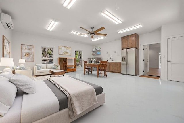 bedroom with an AC wall unit, concrete floors, stainless steel fridge, and a ceiling fan