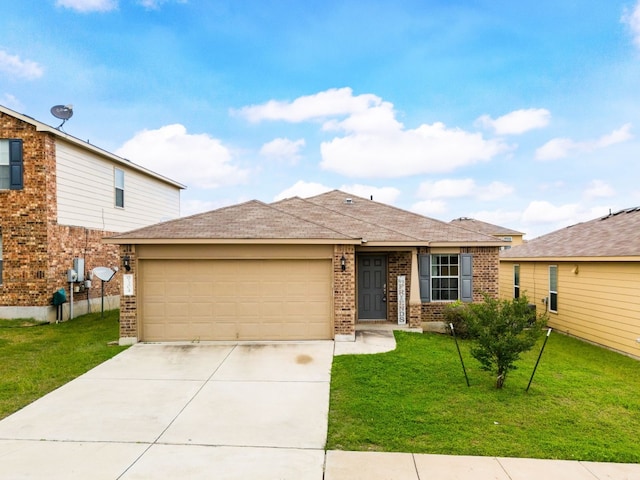 view of front facade featuring a front lawn and a garage