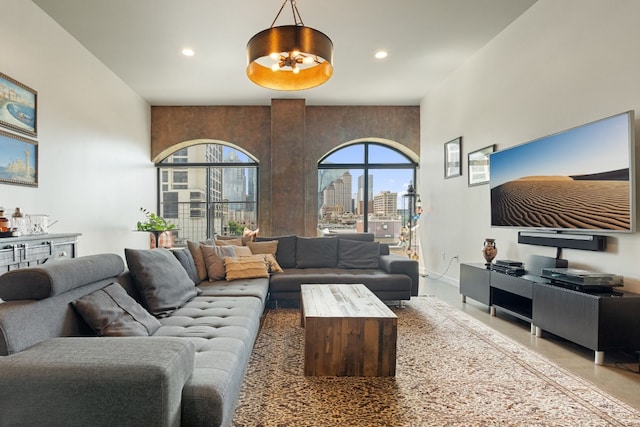 living room with a high ceiling