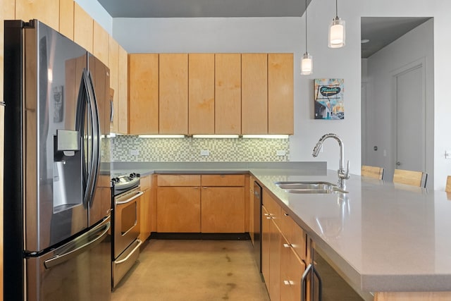 kitchen featuring appliances with stainless steel finishes, light brown cabinetry, sink, decorative light fixtures, and backsplash