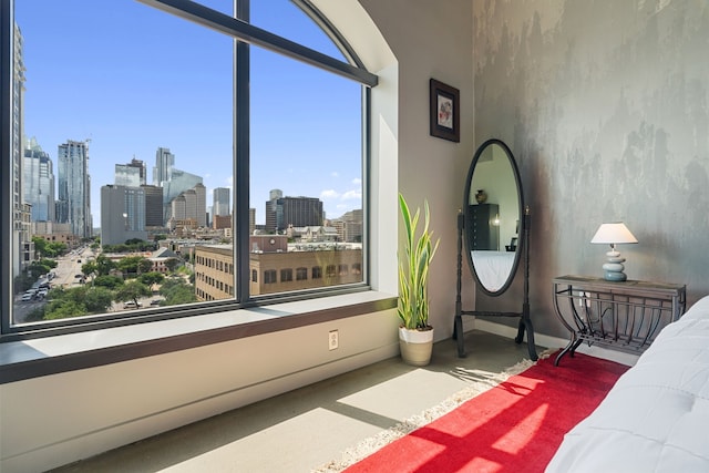 bedroom with multiple windows