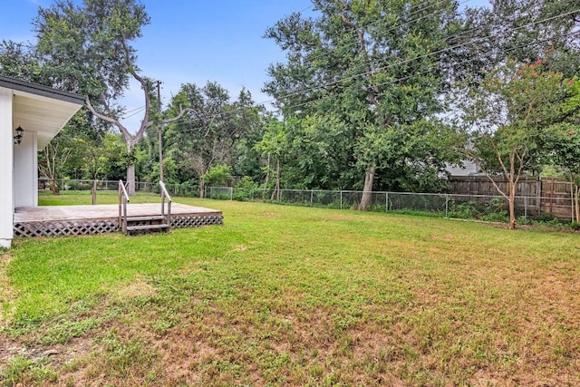 view of yard featuring a deck