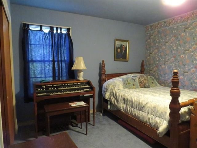 bedroom featuring carpet