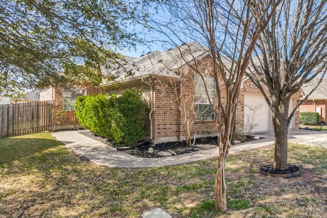 253 Lear Ave, Buda, TX 78610 - view of yard with concrete driveway and an attached garage