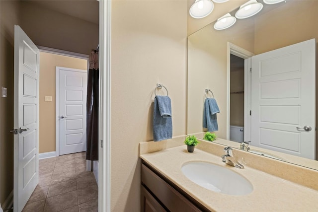 full bath featuring tile patterned flooring and vanity