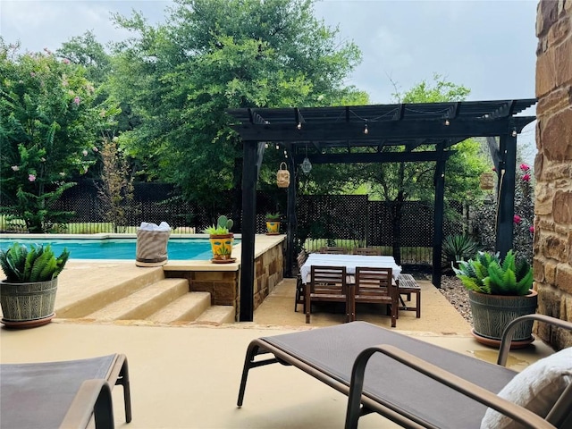 view of patio featuring an outdoor living space, a pergola, a fenced in pool, and fence