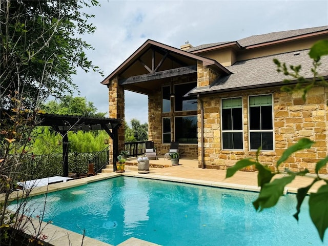 view of swimming pool featuring a patio, a fenced in pool, and a pergola