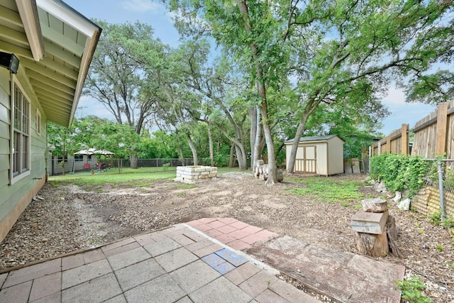 view of patio featuring a storage unit