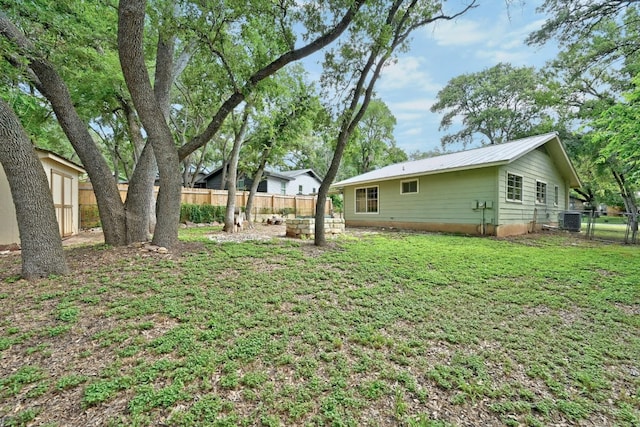 view of yard featuring central AC unit