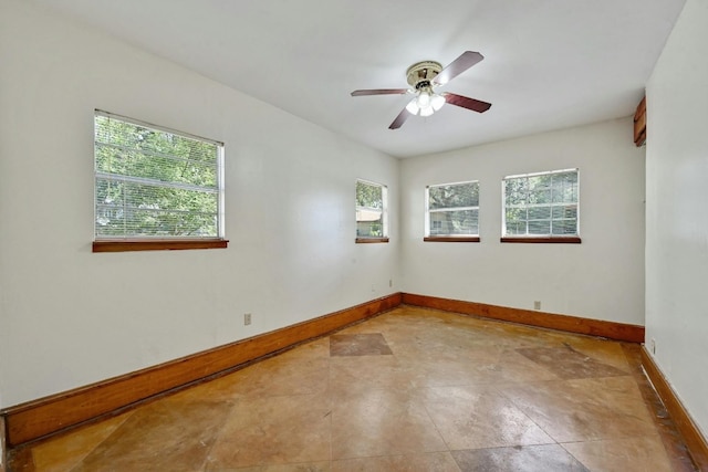 empty room featuring ceiling fan