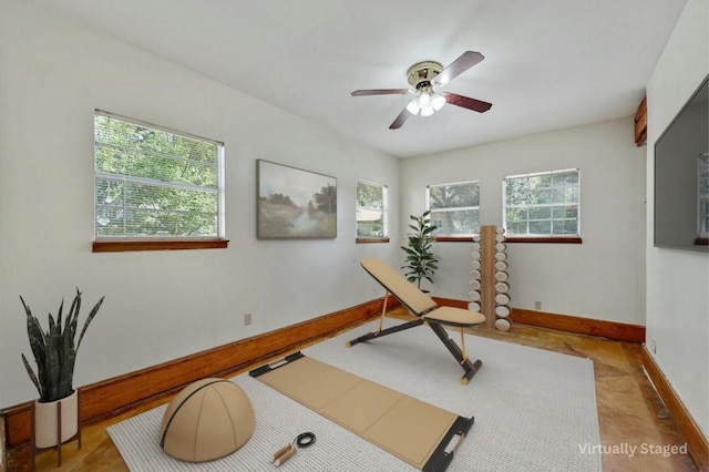 exercise room featuring ceiling fan