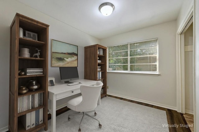 office area with dark hardwood / wood-style flooring