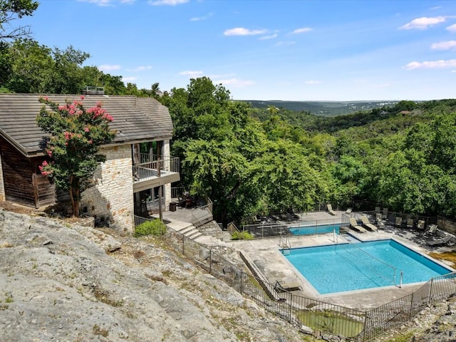 view of pool featuring a patio