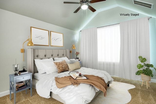 bedroom with ceiling fan, carpet, and vaulted ceiling