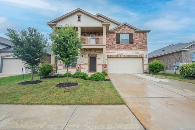 view of front of home featuring a balcony, a front yard, and a garage