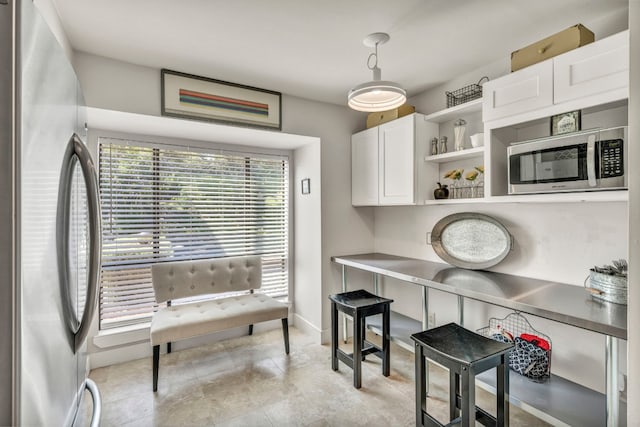 office space with light tile flooring